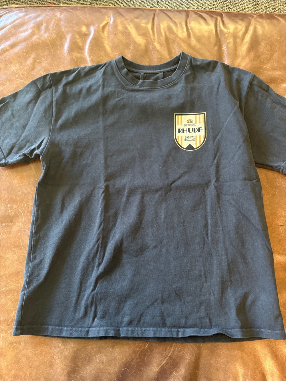 Rhude Men’s  Black Tee with Yellow Shield Patch